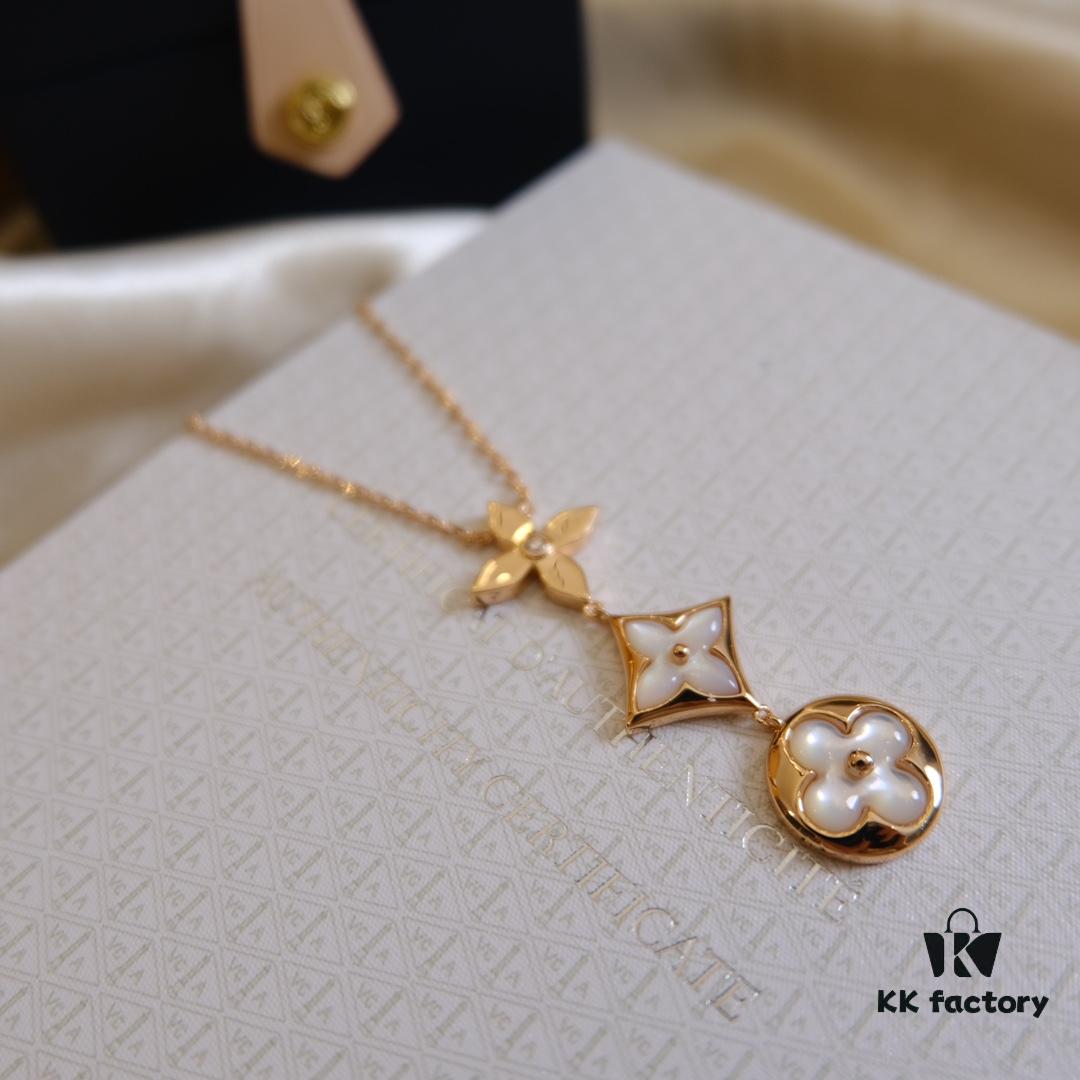 692fcfca99f2d84055c89ca1 Exquisite ZP LV Jewelry with Classic Flower Design, White and Pink Mother-of-Pearl Inlay, Accented with a Small Diamond, Made in V Gold with Sterling Silver Chain