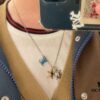 692fcfe499f2d84055c89cd8 Louis Vuitton Aquatics Enamel Starfish and Turtle Necklace