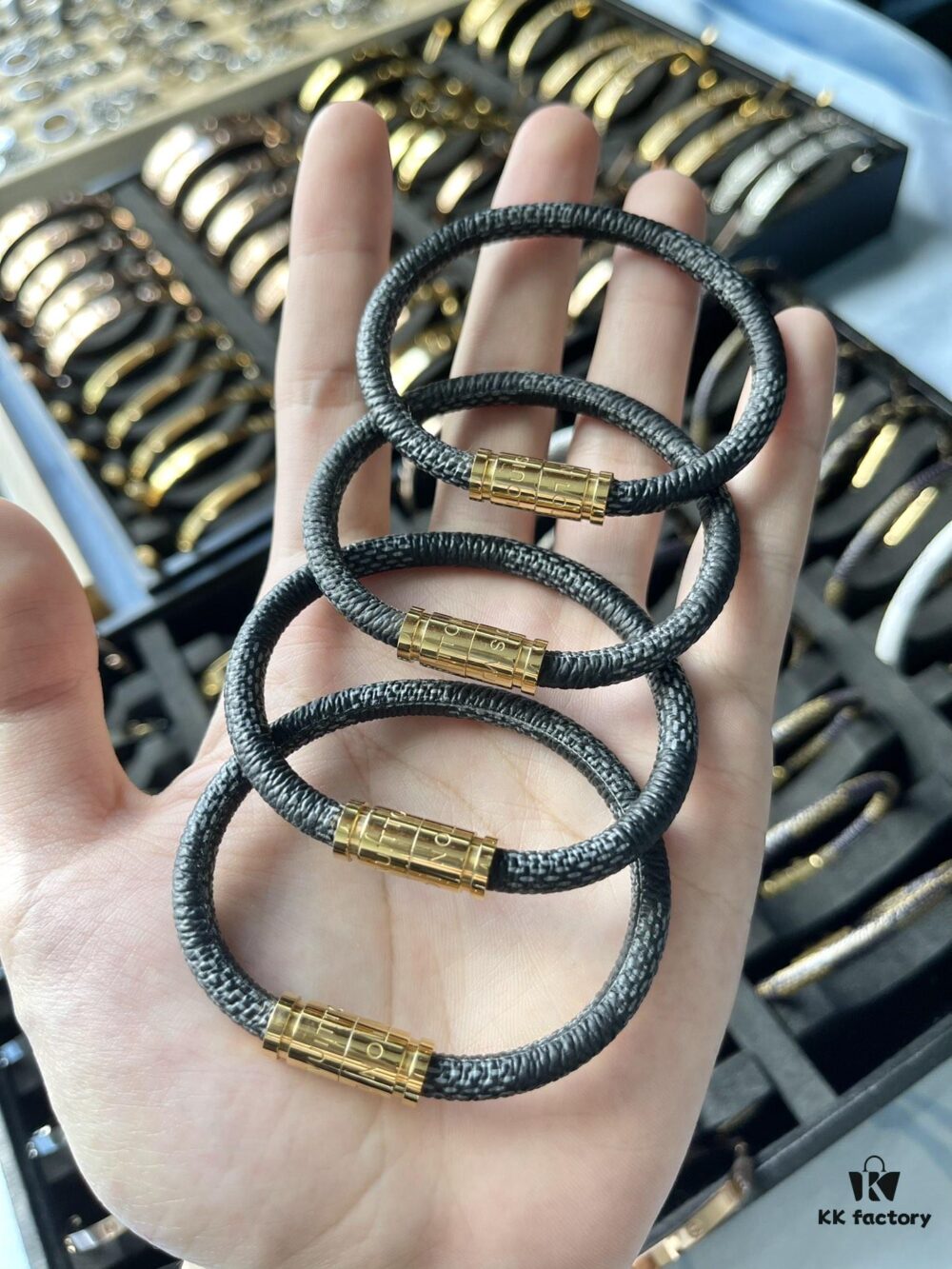 692fd0b399f2d84055c89e3e LV Magnets Bracelet in Gray
