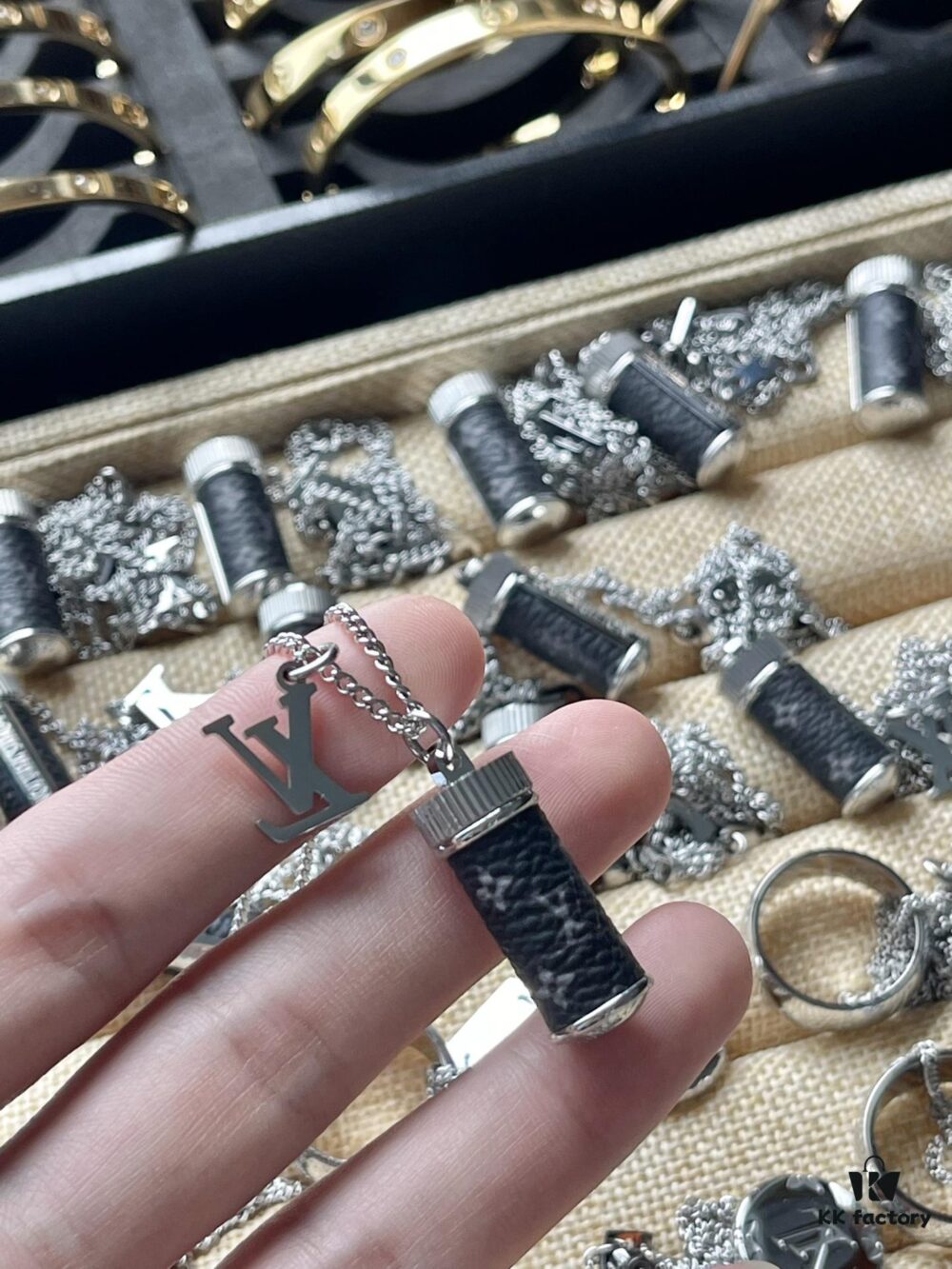 692fd0ba99f2d84055c89e4d LV Perfume Bottle Necklace