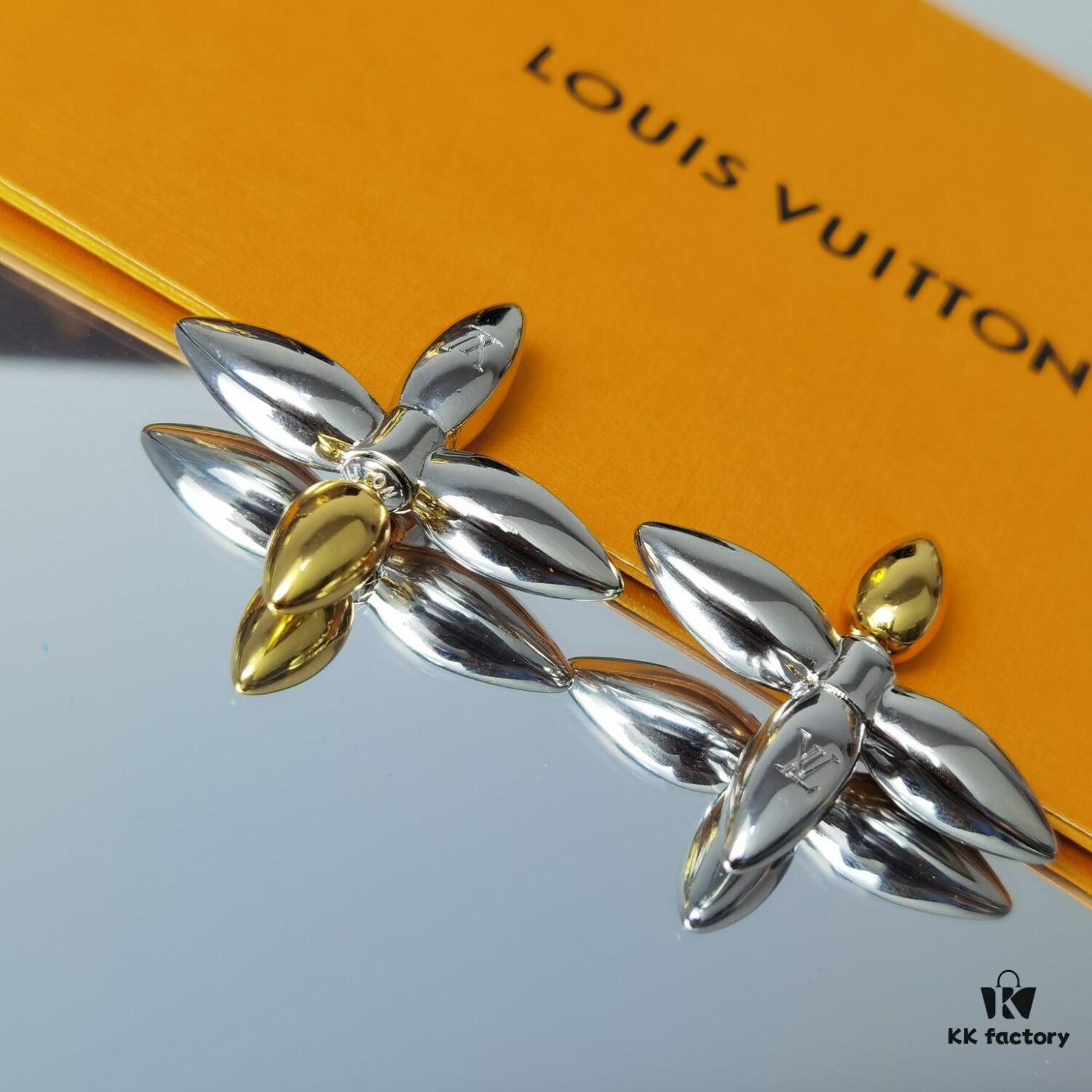 692fd10e99f2d84055c89ed3 Lousiette Stud Earrings Subtly Presenting the Quiet Bloom of Monogram Flowers