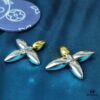 692fd10f99f2d84055c89ed4 Lousiette Stud Earrings Subtly Presenting the Quiet Bloom of Monogram Flowers