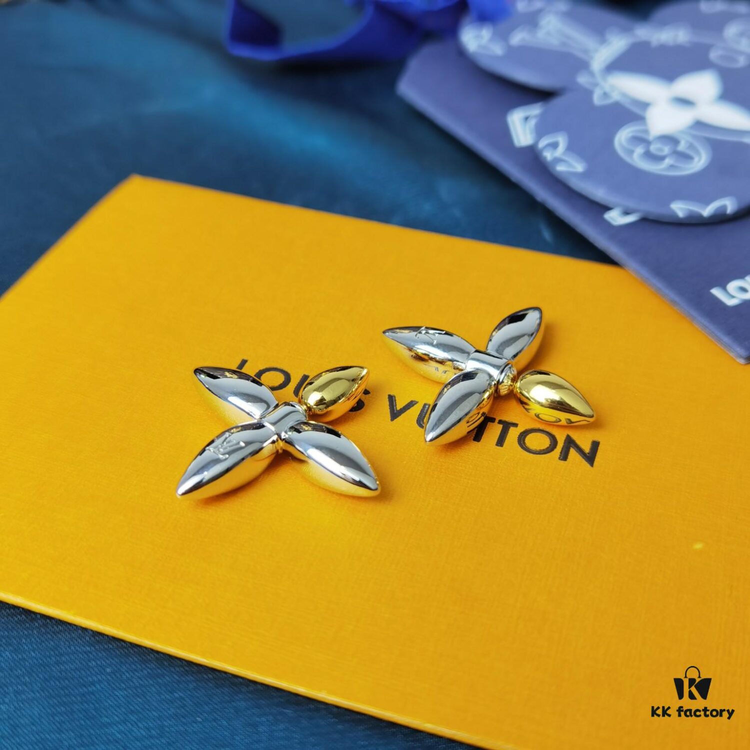 692fd11099f2d84055c89ed6 Lousiette Stud Earrings Subtly Presenting the Quiet Bloom of Monogram Flowers