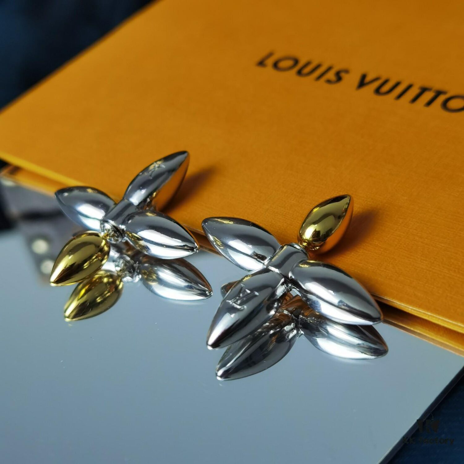 692fd11099f2d84055c89ed7 Lousiette Stud Earrings Subtly Presenting the Quiet Bloom of Monogram Flowers
