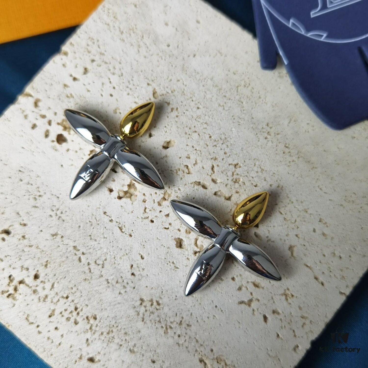 692fd11499f2d84055c89eda Lousiette Stud Earrings Subtly Presenting the Quiet Bloom of Monogram Flowers