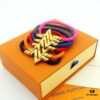 692fd13099f2d84055c89f0b LV Braided Bracelet in Colorful Volt Play 18K Gold Bracelet with Interlocking L and V Motif