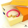 692fd13799f2d84055c89f19 LV Braided Bracelet in Colorful Volt Play 18K Gold Bracelet with Interlocking L and V Motif
