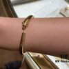 692fd1f199f2d84055c8a0ed New Arrival V Gold Plated 18K Mimetic Gold CNC Hand-Set Diamond Cartier Thin Smooth Leopard Bangle, Ultra Thick and Imposing Leopard Design, Unisex Couple Bracelet