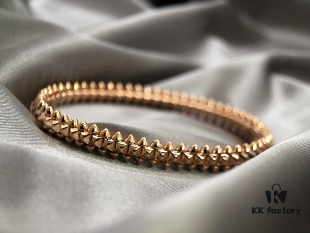 692fd22e99f2d84055c8a16f Cartier-Style Bracelet with Neutral and Edgy Design, Featuring Rotatable Rivets and V-Gold Plating