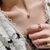 692fd2bd99f2d84055c8a277 Cartier Love Pearl Necklace and Stud Earrings, Chanel Coco Crush Mini Narrow Ring, BV Snake Bone Mother-of-Pearl Diamond Ring