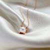 692fd2c499f2d84055c8a285 Cartier C de Cartier Pearl Necklace with Bull Head Design