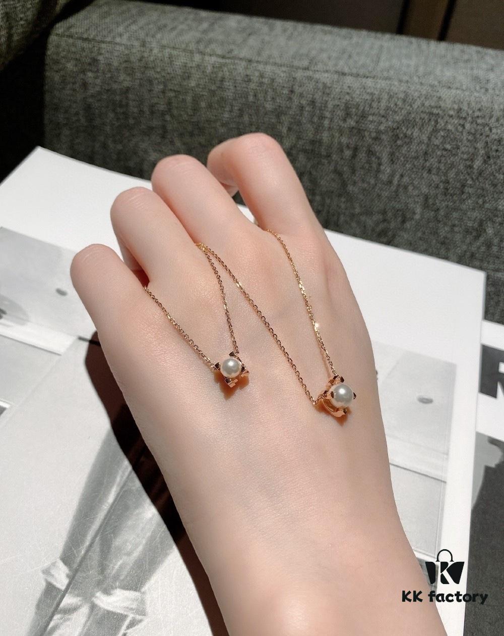 692fd2ec99f2d84055c8a2d1 Cartier Love Pearl Necklace and Stud Earrings, Chanel Coco Crush Mini Narrow Ring, BV Snake Bone Mother-of-Pearl Diamond Ring