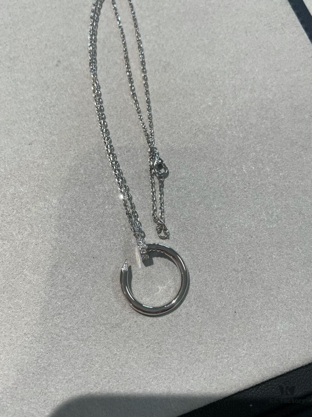692fd34699f2d84055c8a357 Cartier Platinum Nail Necklace