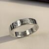 692fd3d899f2d84055c8a44c Cartier 4mm Scaled Single Diamond Letter Ring