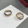 692fd40499f2d84055c8a47d Cartier Trinity Ring Set in Three Colors of Gold – A Timeless Classic