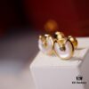 692fd40599f2d84055c8a47e Cartier Amulette de Cartier Classic Stud Earrings, Round Bezel with White Mother-of-Pearl and Green Malachite, CNC Precision-Carved Triple-Layer UFO Design, Double-Sided Inlay, Exquisite Craftsmanship