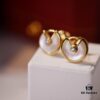 692fd40d99f2d84055c8a487 Cartier Amulette de Cartier Classic Stud Earrings, Round Bezel with White Mother-of-Pearl and Green Malachite, CNC Precision-Carved Triple-Layer UFO Design, Double-Sided Inlay, Exquisite Craftsmanship