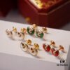 692fd41599f2d84055c8a493 Cartier Amulette de Cartier Classic Stud Earrings, Exquisite CNC-Carved Lucky Charm with White Mother-of-Pearl and Green Malachite, Dual-Tone Design, Triple-Layer Flying Saucer Pendant, Fully Encrusted with Brilliant Diamonds