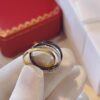 Cartier Trinity Three-Band Ring in Yellow Gold, White Gold, and Black Ceramic