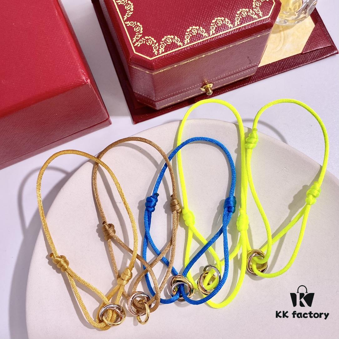 692fd42699f2d84055c8a4b1 Cartier Three-Ring Tricolor 18K Lucky Red Braided Adjustable Bracelet