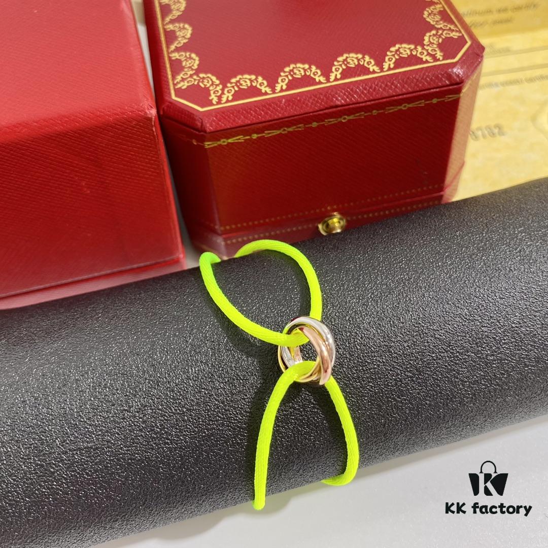 692fd42e99f2d84055c8a4c0 Cartier Three-Ring Tricolor 18K Lucky Red Braided Adjustable Bracelet