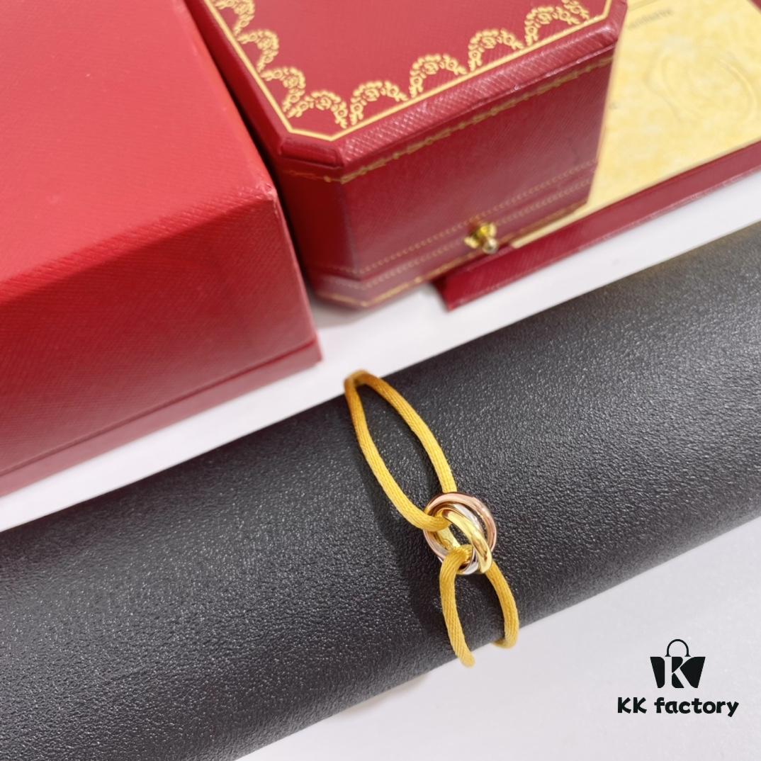 692fd44599f2d84055c8a4e2 Cartier Three-Ring Tricolor 18K Lucky Red Braided Adjustable Bracelet