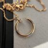 692fd4a199f2d84055c8a559 Cartier Diamond-Studded Nail Necklace in Rose Gold Color