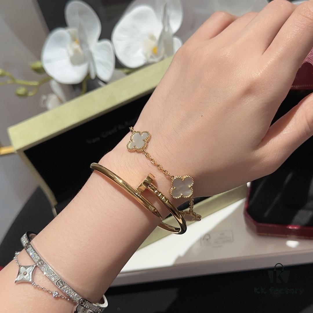 692fd4fd99f2d84055c8a5f3 Versatile Top-Tier Jewelry: VCA-Inspired Five-Petal White Mother-of-Pearl Bracelet and Cartier-Style Nailed Polished Gold Bangle, Thick 18K Gold Plated with Natural White Mother-of-Pearl