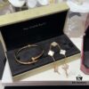 692fd4fe99f2d84055c8a5f5 Versatile Top-Tier Jewelry: VCA-Inspired Five-Petal White Mother-of-Pearl Bracelet and Cartier-Style Nailed Polished Gold Bangle, Thick 18K Gold Plated with Natural White Mother-of-Pearl