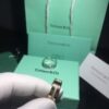 692fd57099f2d84055c8a6e4 Bestselling Tiffany Classic Double-T Ring with CNC-Set Diamonds in Rose Gold and White Gold