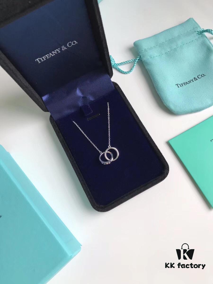 692fd58199f2d84055c8a705 Tiffany & Co. T1837 Double Ring Necklace with Toggle Closure, Fashionable Silver Pendant Inspired by the Brand's Founding Year