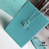 692fd58299f2d84055c8a706 Tiffany & Co. T1837 Double Ring Necklace with Toggle Closure, Fashionable Silver Pendant Inspired by the Brand's Founding Year