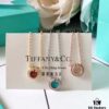 692fd59099f2d84055c8a71f Tiffany T Two Small Hoop Necklace with Red Agate, Turquoise, and Mother-of-Pearl – Limited Edition for Chinese New Year, Global Launch in China
