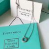 692fd59099f2d84055c8a721 Tiffany T Two Small Hoop Necklace with Red Agate, Turquoise, and Mother-of-Pearl – Limited Edition for Chinese New Year, Global Launch in China