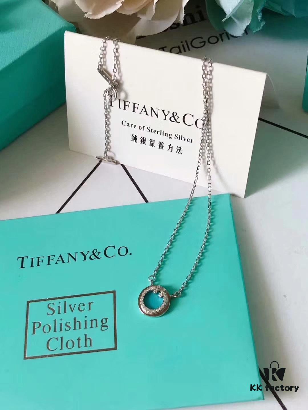 692fd59099f2d84055c8a721 Tiffany T Two Small Hoop Necklace with Red Agate, Turquoise, and Mother-of-Pearl – Limited Edition for Chinese New Year, Global Launch in China