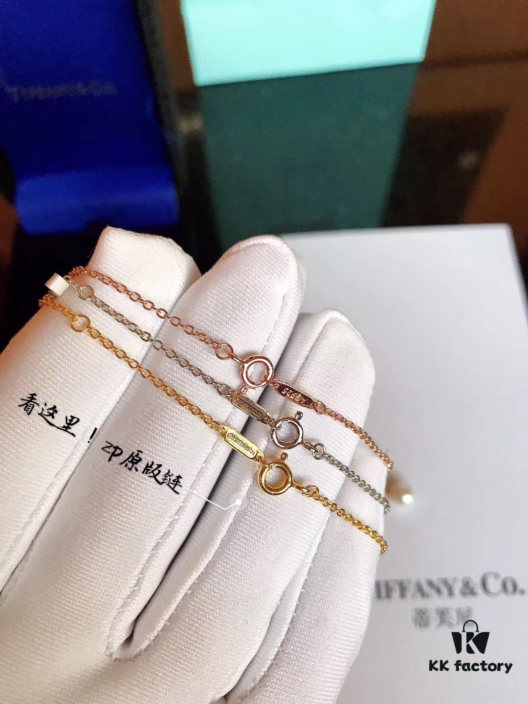 692fd5ba99f2d84055c8a776 Tiffany & Co. Elsa Peretti® Open Heart Pearl Necklace with Sautoir Design, 8mm Pearl, 1.0cm Heart