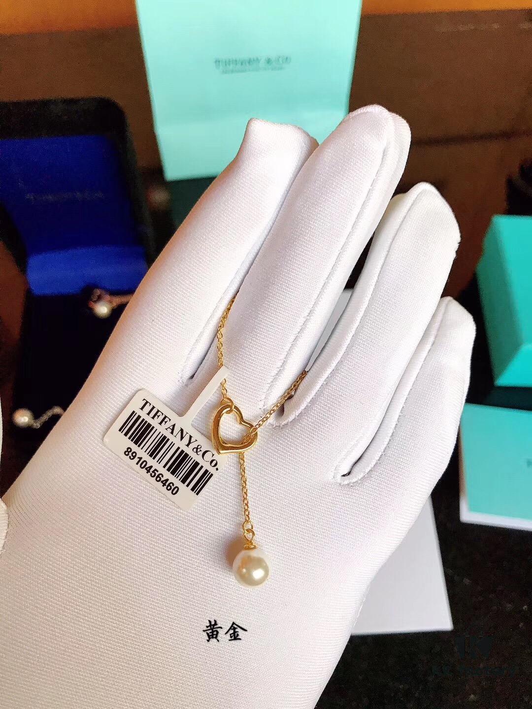 692fd5bb99f2d84055c8a778 Tiffany & Co. Elsa Peretti® Open Heart Pearl Necklace with Sautoir Design, 8mm Pearl, 1.0cm Heart