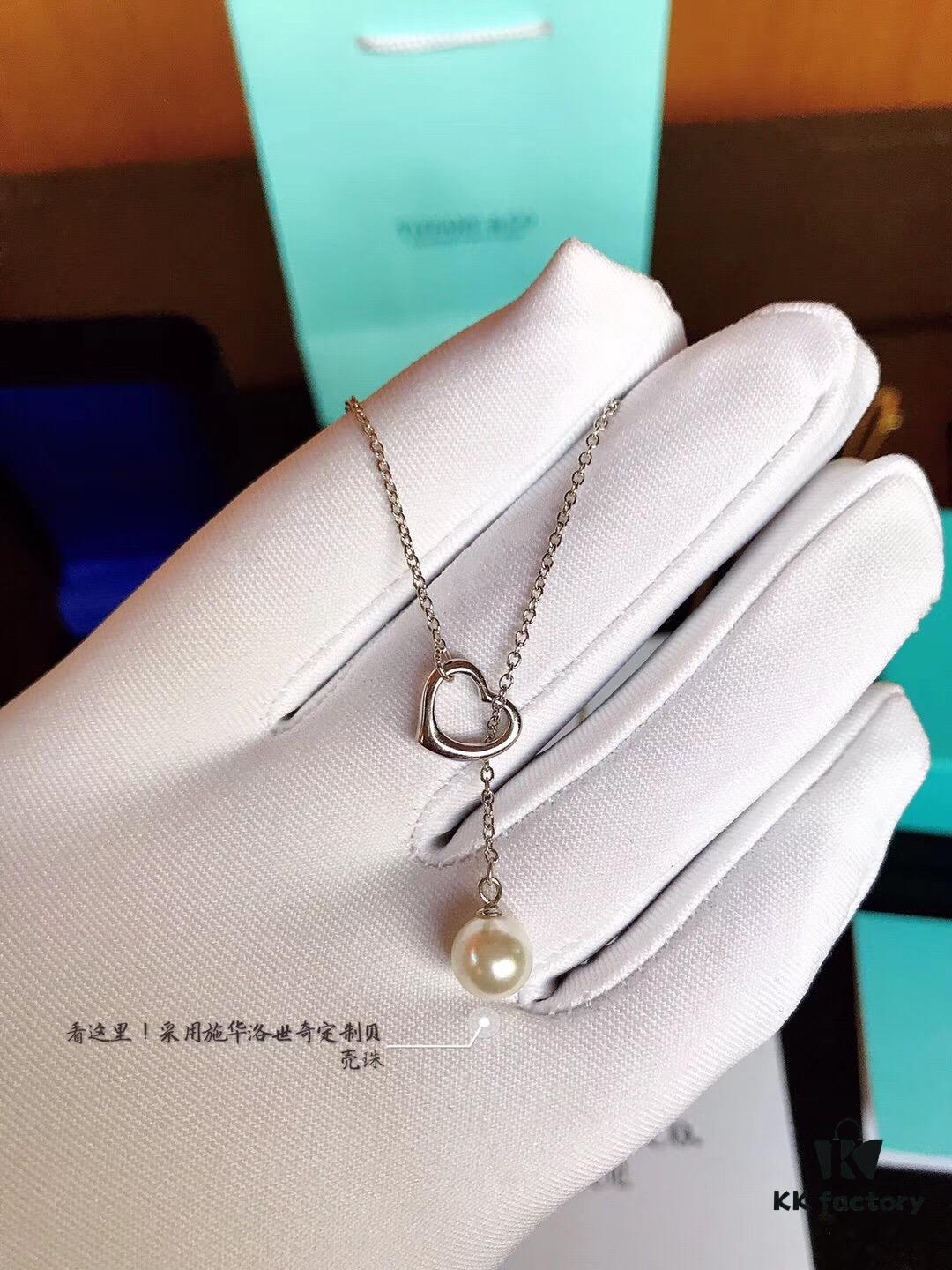 692fd5d699f2d84055c8a7a6 Tiffany & Co. Elsa Peretti® Open Heart Pearl Necklace with Sautoir Design, 8mm Pearl, 1.0cm Heart