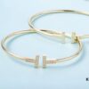 692fd5e599f2d84055c8a7ce Must-have Tiffany & Co. Double T Diamond Bracelet with Adjustable Memory Design, AU750 Logo Stamp, S925 Silver Plated with 18K Gold, Set with 5A Zirconia