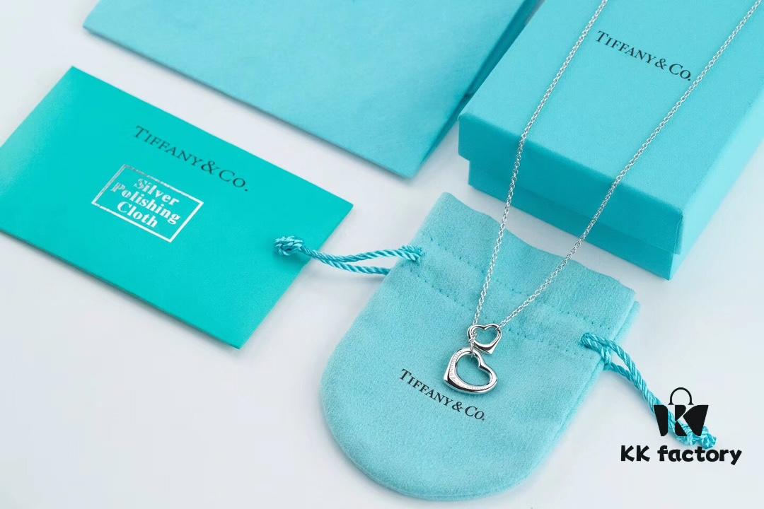 692fd60499f2d84055c8a820 Tiffany & Co. Heart Pendant Necklace Set, Small and Large Hearts, 925 Sterling Silver with Rhodium Plated Finish, Reversible Design with Original Engraving and Designer Signature Logo