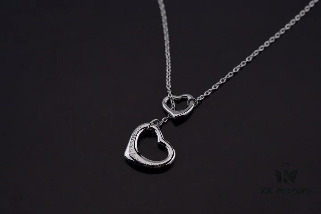 692fd60599f2d84055c8a822 Tiffany & Co. Heart Pendant Necklace Set, Small and Large Hearts, 925 Sterling Silver with Rhodium Plated Finish, Reversible Design with Original Engraving and Designer Signature Logo