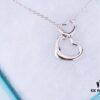 692fd60599f2d84055c8a823 Tiffany & Co. Heart Pendant Necklace Set, Small and Large Hearts, 925 Sterling Silver with Rhodium Plated Finish, Reversible Design with Original Engraving and Designer Signature Logo
