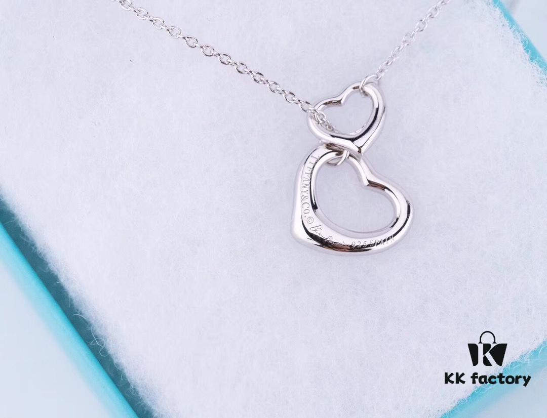 692fd60599f2d84055c8a823 Tiffany & Co. Heart Pendant Necklace Set, Small and Large Hearts, 925 Sterling Silver with Rhodium Plated Finish, Reversible Design with Original Engraving and Designer Signature Logo