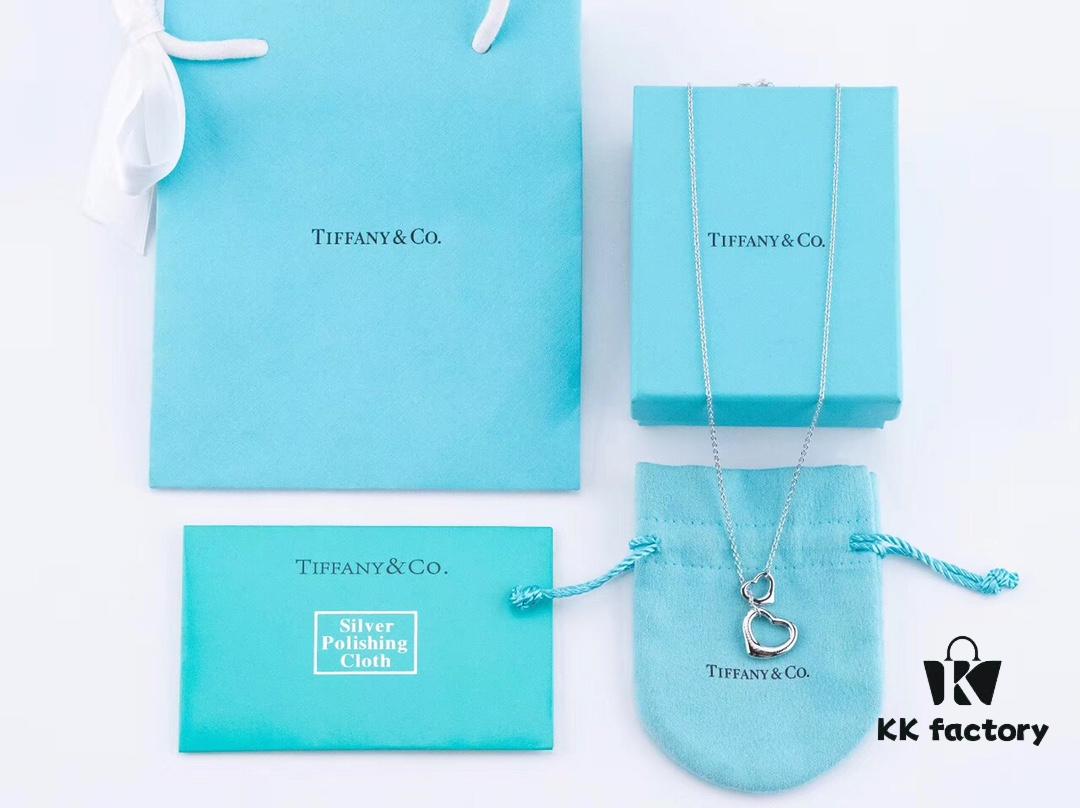 692fd60599f2d84055c8a824 Tiffany & Co. Heart Pendant Necklace Set, Small and Large Hearts, 925 Sterling Silver with Rhodium Plated Finish, Reversible Design with Original Engraving and Designer Signature Logo