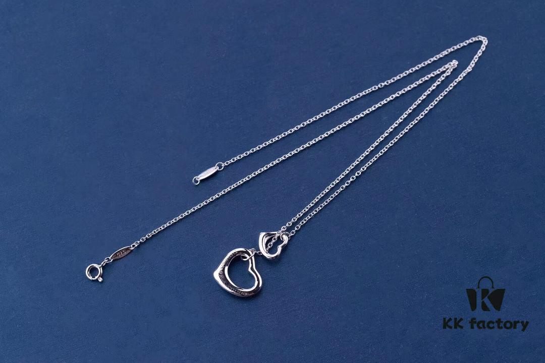 692fd60699f2d84055c8a826 Tiffany & Co. Heart Pendant Necklace Set, Small and Large Hearts, 925 Sterling Silver with Rhodium Plated Finish, Reversible Design with Original Engraving and Designer Signature Logo