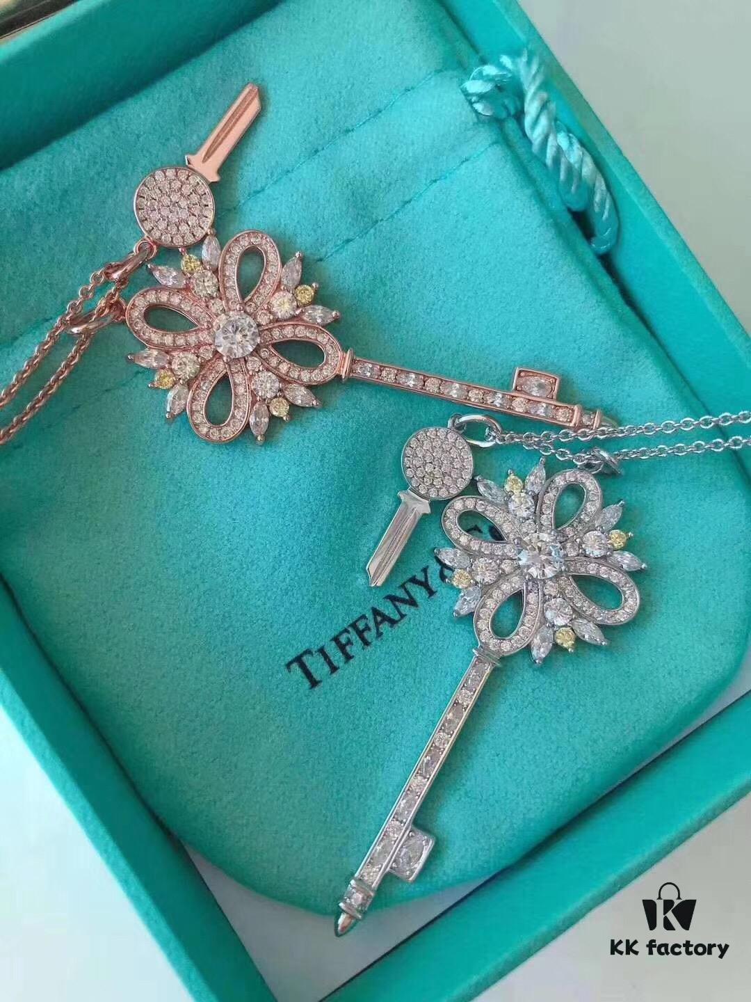 692fd61d99f2d84055c8a85e Tiffany & Co. Classic Double Key Snowflake Sweater Chain with Small Yellow Diamond Accents, Featuring Elegant Logo, Available in White Gold and Rose Gold