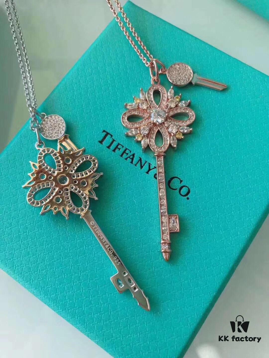 692fd61f99f2d84055c8a860 Tiffany & Co. Classic Double Key Snowflake Sweater Chain with Small Yellow Diamond Accents, Featuring Elegant Logo, Available in White Gold and Rose Gold