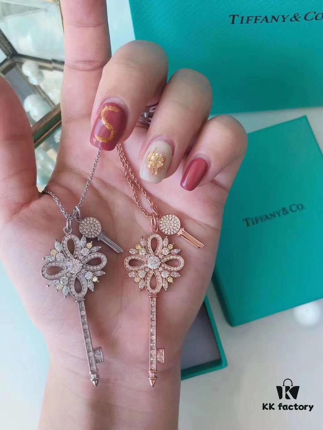 692fd62699f2d84055c8a869 Tiffany & Co. Classic Double Key Snowflake Sweater Chain with Small Yellow Diamond Accents, Featuring Elegant Logo, Available in White Gold and Rose Gold