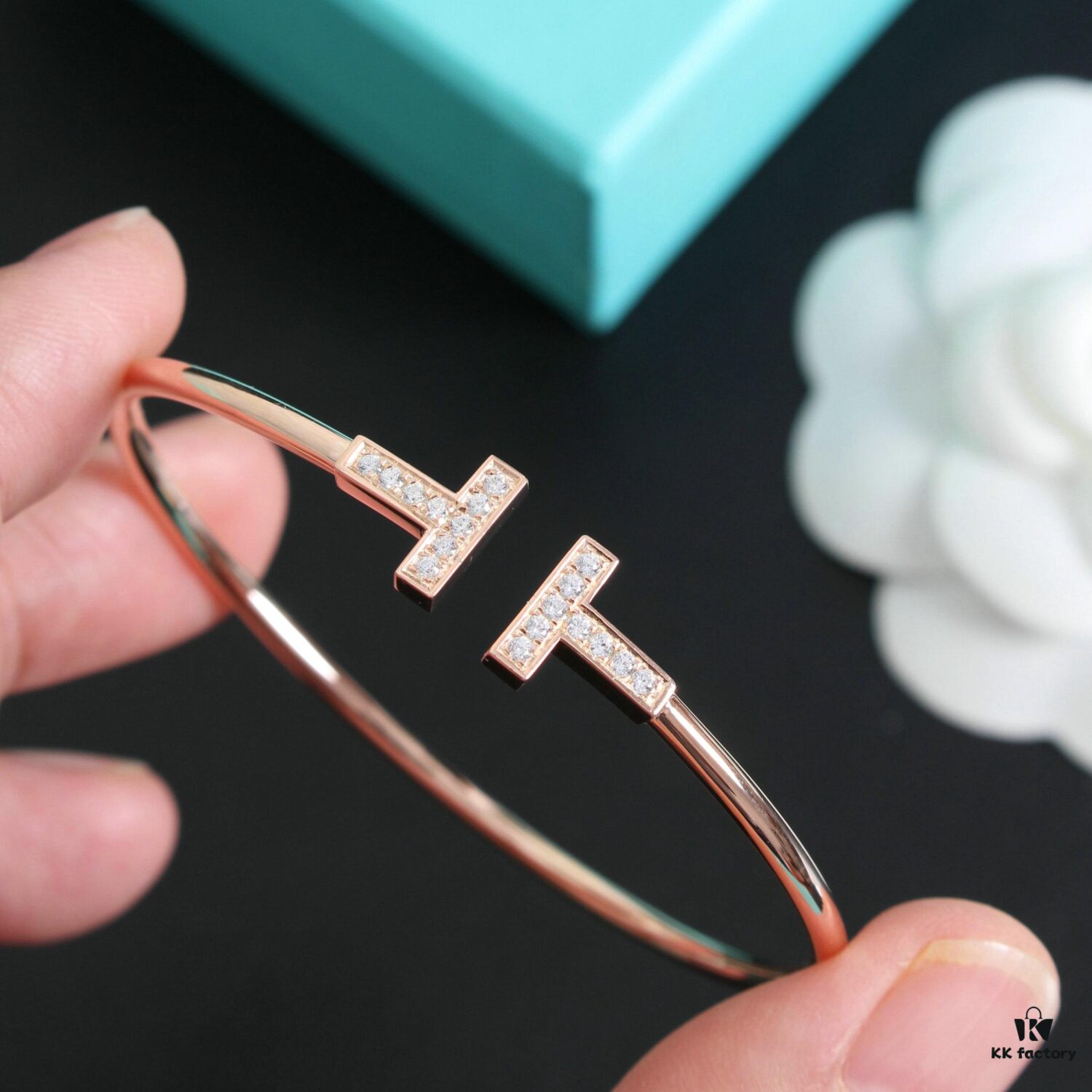 692fd62c99f2d84055c8a871 Tiffany & Co. Double T Diamond Bracelet with Adjustable Memory Design