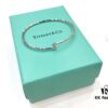 692fd63f99f2d84055c8a89c Tiffany & Co. Elsa Peretti Loop Bangle with Diamonds